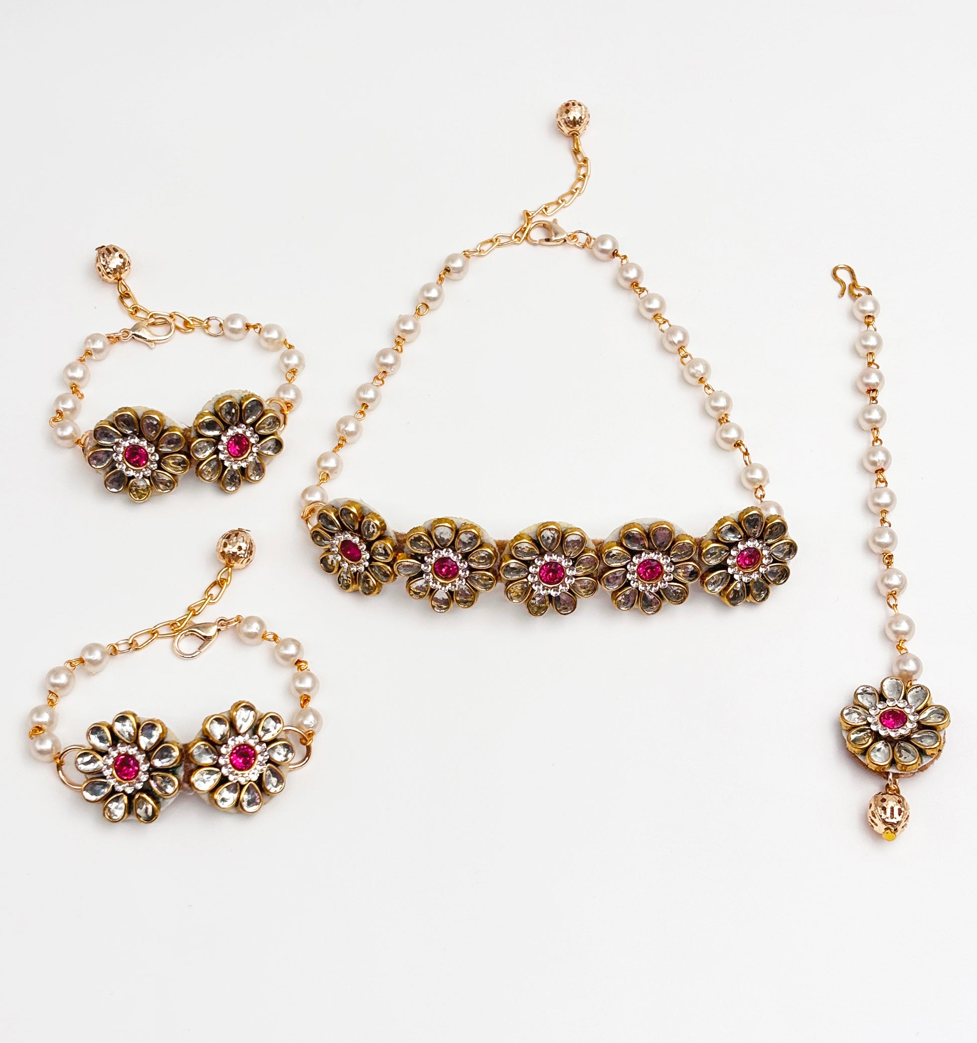 Mrigya Kundan Floral Choker, Bracelets & Maang Teeka Set