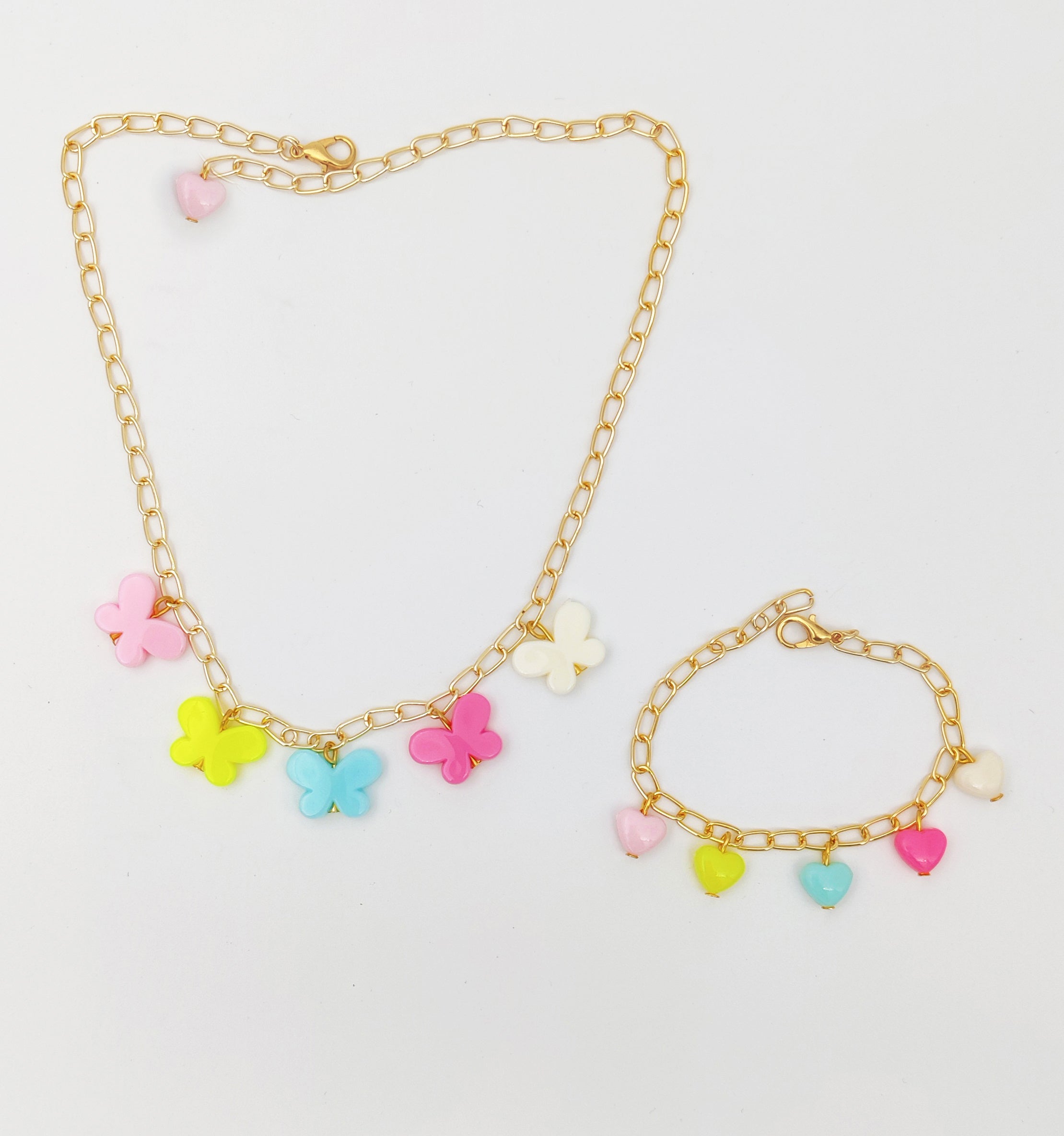 Gift Set Of Butterfly, Hearts Beaded Necklace, Bracelet & Dangling Clips, 3 Finger Rings & 6 Pom Pom Rubberbands