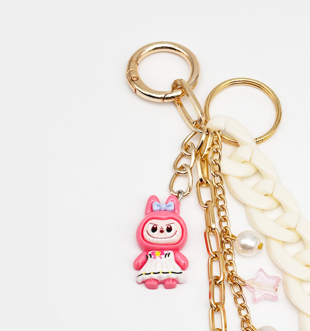 Labubu Charmed Bag Charm & Keychain- Pink, Golden