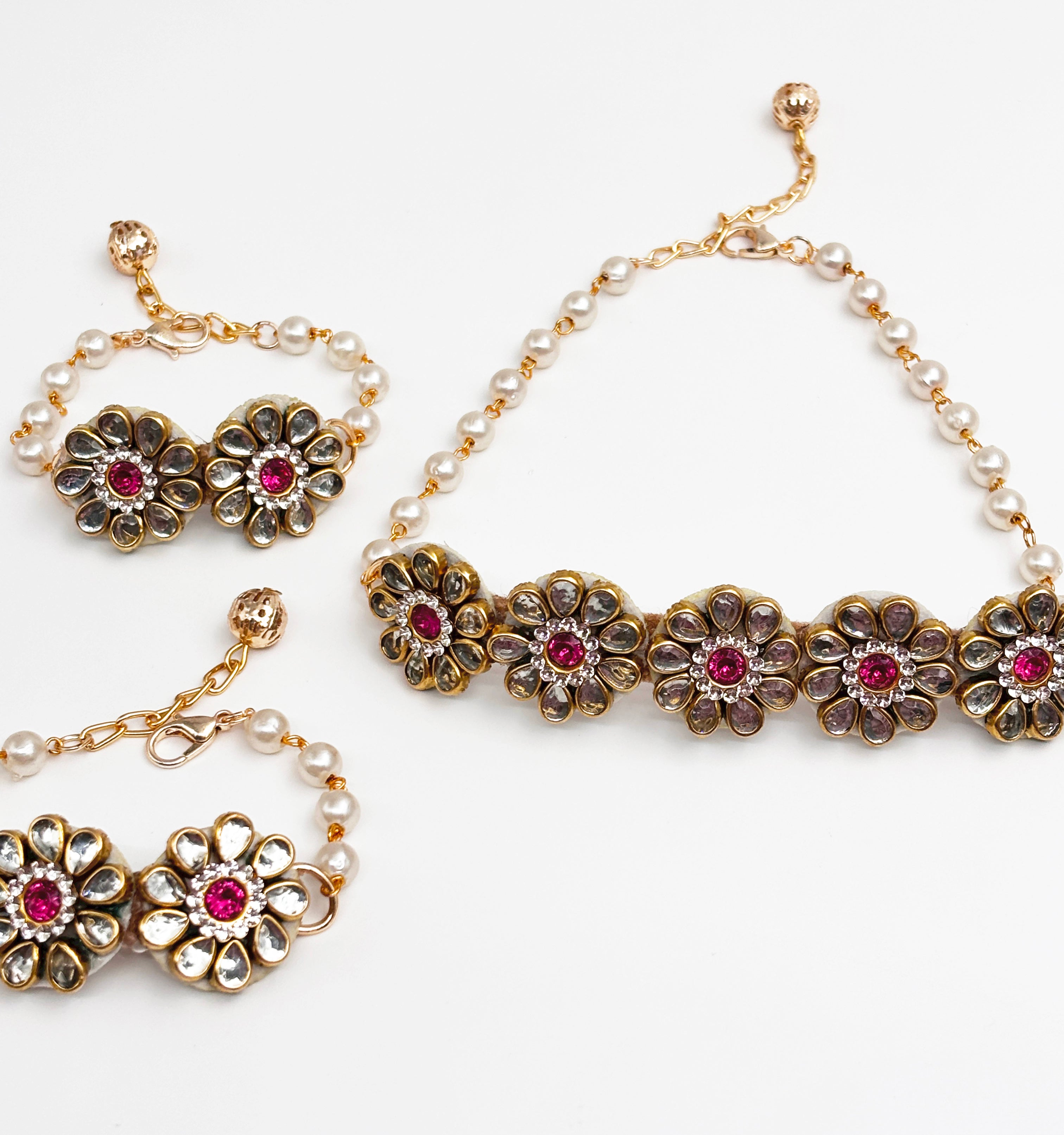 Image of Mrigya Kundan Floral Choker, Bracelets & Maang Teeka Set
