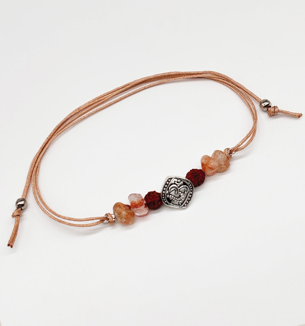 Om Charm & Natural stones detailed Rakhi