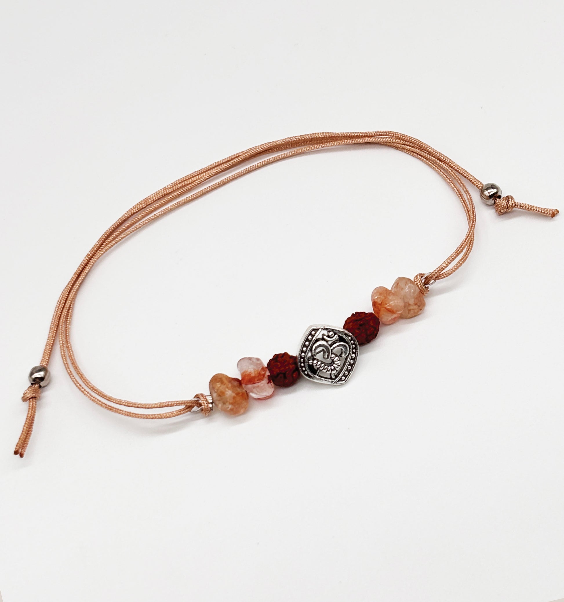 Om Charm & Natural stones detailed Rakhi